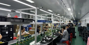 Assembly line finishing custom PVC figurines